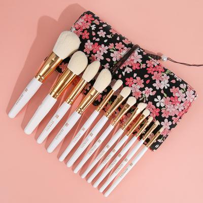 China Angular Blush 12 Pcs Pink Green White Makeup Brush Set Full Set Loose Powder Blush Super Soft Eyeshadow Makeup Brush for sale