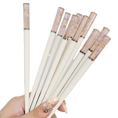 China Alloy Minimalist High Temperature Resistant Creative Red Amber Chopsticks Chopsticks Net Non-slip Japanese Household for sale