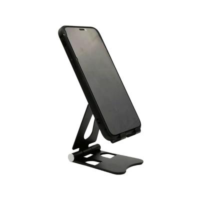 China Adjustable Foldable Tablet Stand with Anti-skid Base and Left Cell Phone Holders Adjustable Cell Phone Filling Desk Stand for sale