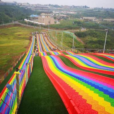 중국 Theme Park Colorful Dry Slide Kids Plastic Rainbow Slide For Sale 판매용