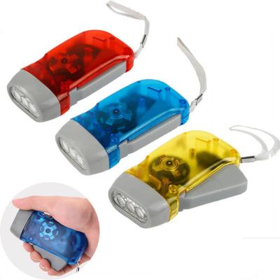 China Emergency 3 LED Hand Pressing Dynamo Flashlight Crank Power Wind Up Torch Light Camp Lamp for sale