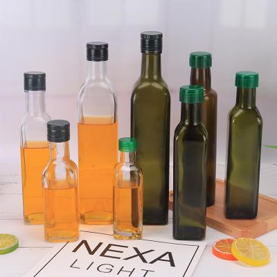 China Customized Round Kitchen Stocked Square Green Olive Oil Glass Bottle Manufacturer Glass Olive Oil Bottle for sale