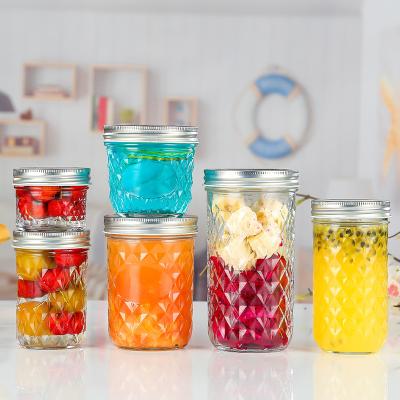 China 250ml Clear Food Round Shaped Glass Jars Caviar Jars With Silver Screw Lids for sale