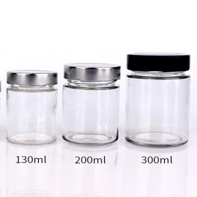 China Food Glass Container Mason Jar 100ml 180ml 280ml 380ml Honey Glass Jar Honey With Size Metal Cap for sale