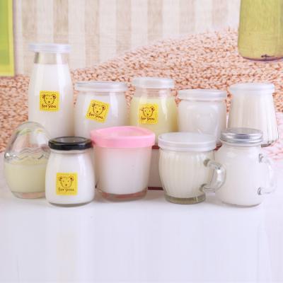 China Empty Wide Mouth Glass Jar Milk Pudding Yogurt Beverage 50ml 100ml 200ml Glass Bottle With Cap for sale