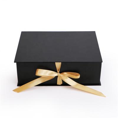 China Recyclable Book Form Matte Black Foldable Gift Box With Large Flat Folding Ribbon for sale