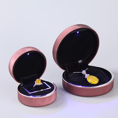 China Custom Size Leather Small Luxury Black Leather Led Light Wedding Ring Box for sale