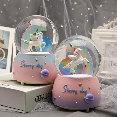 China Wholesale Europe Resin Music Rainbow Horse Snow Globe for sale