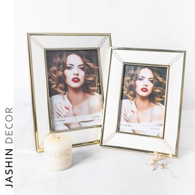 China Modern Luxury Different Leather Metal Picture Frame Metal Style Aluminum Plated Picture Frame for sale