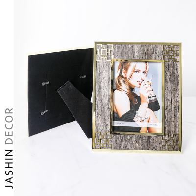 China Gold modern luxury glitter picture frame metal edge picture frame composite material flat photo view for sale