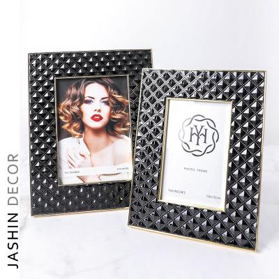 China The latest design photo frame metal frame new arrival modern luxury high-end leather photo frame products for sale