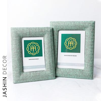 China Modern Luxury Green Cloth Glass Picture Frame Picture Frame Commemorative Luxury Nordic Wedding Picture Picture Frame for sale