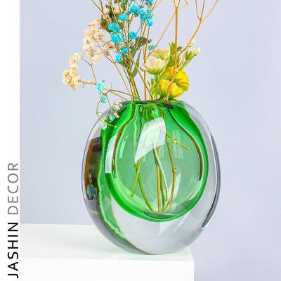 China 2021 Europe new style modern art luxury green glass flower vase for hotel home decor for sale