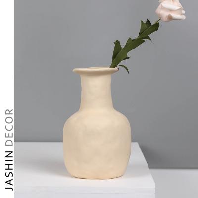 China Modern Minimalist Unique Design Ceramic Black Vase Decor Sculpture Indoor Flower Vase for sale