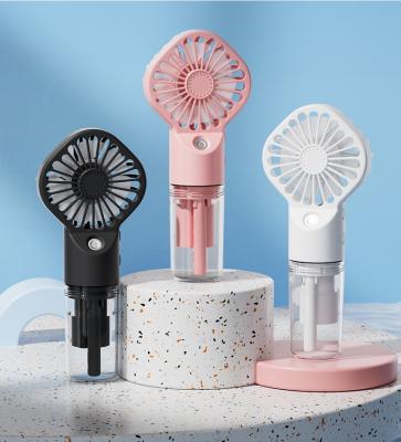 China Hand Held Spray Fan Portable Mini Charging Spray Humidification Gift Handheld Small Fan for sale