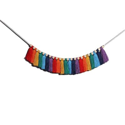 China Modern Simple Iridescent Cotton Rope Wall Hanging Decoration with Tassels Bedroom Home Decor for Girls for sale