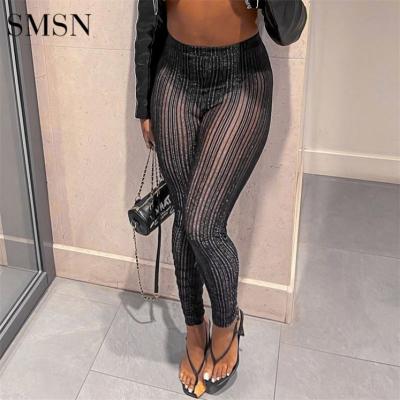 China Anti-pilling Latest Design Ladies Pants New 2022 Spring Women Solid Color Sexy Hip Lifting Sequin Hollow Out Gaiters for sale