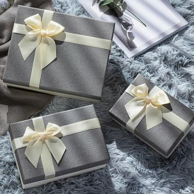 China Rectangular Gray Gift Box Creative Bowknot Biodegradable High Grade Stain Handmade Gift Cardboard Box for sale