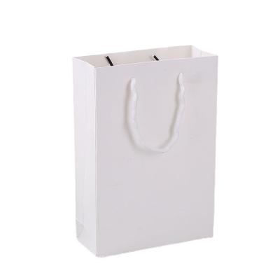 China Recyclable in stock white cardboard paper bag clothing shopping paper bag portable custom kraft paper bag for sale