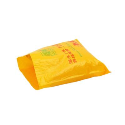 China Customized Recyclable Low Price Printing Yellow Color PP Woven Bag For Corn Feed for sale