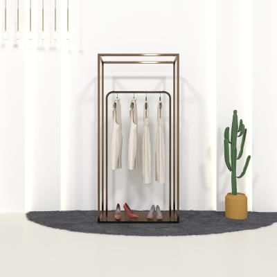 China Luxury Luxurious Wall Cabinets/Elegant Design Women's Clothing Display Rack Rack Clothing Display Rack for Store for sale