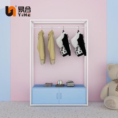 China Customized Metal Hanger 2 Tier Kids Clothes Floor Standing Garment Rack Kids Clothing Display Rack For Shoe for sale