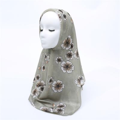 China Latest Polyester Hijab Flower Glitter Tudung Bark Corrugated Square African Hijab Foil Print Floral Hijab for sale