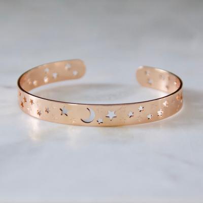 China FASHIONABLE Hollow Stainless Steel Star Beautiful Dreamy Moon and Star Bangle Pattern Custom Bangle for sale