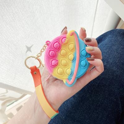 China Mini Portable Keychain Planet Fidget Popular Wholesale Cute Bag Effort Release Purse Silicone Dangle Coin Purse 5cm for sale