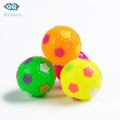 China Funny Hot Selling Flashing Football Shaped Spiky Ball Toy For Kids for sale