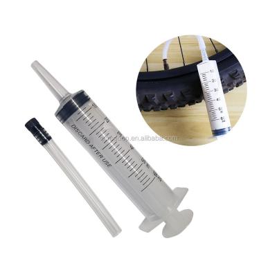 China Bicycle sealant injector syringe with valve adapter and soft tube injector for sale