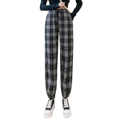 China Anti-wrinkle plaid black white harem pants girls casual drawstring high waist pants women for sale