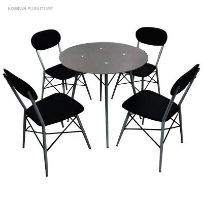 China Sleek modern style glass dining room furniture with 4 chairs dining table set for sale