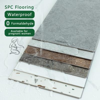 China Water Resistant Top Grade Waterproof Stone Plastic Composite Tile For Bathroom SPC Flooring for sale