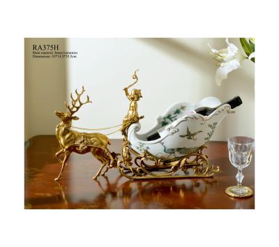 China Art Decor Porcelain and copper decorative crafts restaurant table fireplace ornaments European sleigh deer car wine rack fruit basin for sale