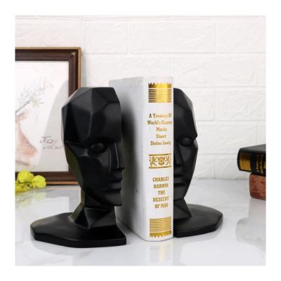 China Art Decor Creative Color Men's Bookend Push Book Stand Home Decoration Abstract Resin Statue Head Decoration for sale