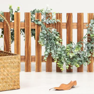 China Hot sale artificial eucalyptus rattan vine decoration Q048 leaves plant decoration simulation home rattan for sale