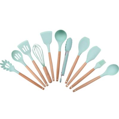 China Sustainable Silicone Kitchen Utensils Silicone Kitchenware With Wooden Handle for sale