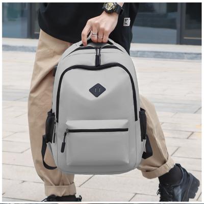 China With USB Men Boy Style Middle East Market Trends Fashion Classic College Backpack High School Bag for sale