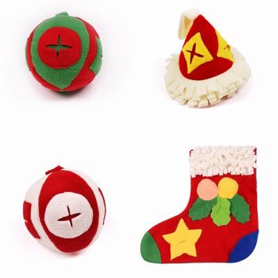 China 2021 Sustainable Christmas Hat Stock Dog Nose Toy Set Dog Food Hiding Toy Ball for sale