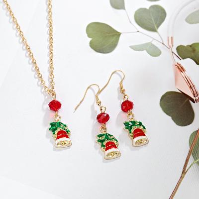 China Fashion Trendy Christmas Bell Bow Gold Girl Earring Necklace Jewelry Set for sale