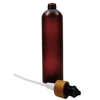 China Non Spill Wholesale 400ml Amber Plastic Bottle With Bamboo Flow Through Lotion Pump for sale