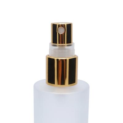 China Non Spill 20mm Luxury Gold Aluminum Plastic Fine Mist Sprayer for sale