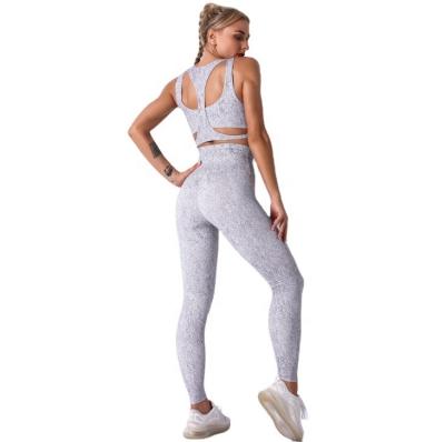 China QUICK DRY yoga bra set sports running pants women fitness sports hip print sexy workout apparel for sale