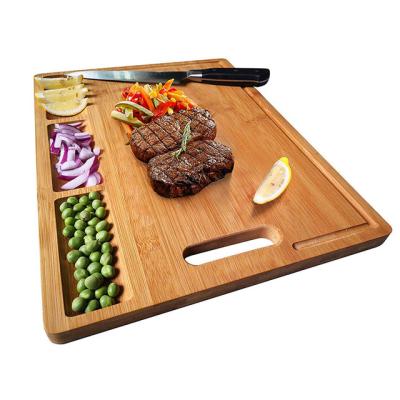 China Large Sustainable Rectangle Meat Bread Fruit Kitchen Bamboo Cutting Board With Compartments for sale