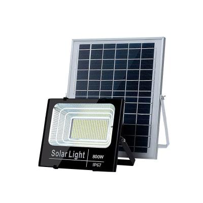 China Newest Design Warehouse Security Remote Control Solar Panel Flood Light IP66 Adjustable Work Energy Saving Outdoor Smart Lamp for sale