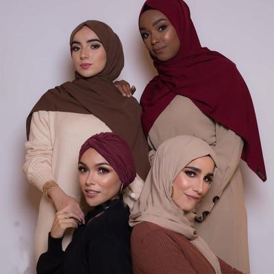 China Hot Selling Muslim Women's Muslim Hijab Scarf Long Solid Color Wrinkle Cotton Scarf Fold Hijab Islam Fashion Muslim Scarves Long for sale