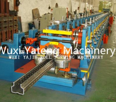 China High Durable Q235 Storage Rack Roll Forming Machine with H - Beam Base Support for sale