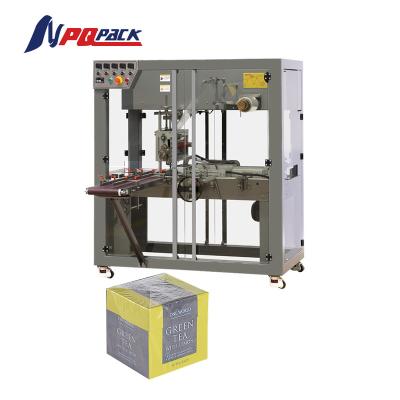 China Food cellophane wrapping machine transparent film packing machine ovewrapping machine for sale