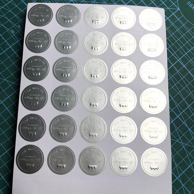 China Metallic Silver Hardware Brushed Custom Round Logo Shape Embossed Silver Foil Vinyl Sticker for sale